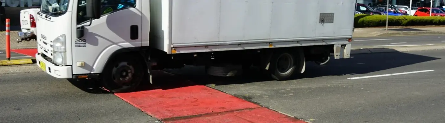 Truck in front of a Steel Road Plate